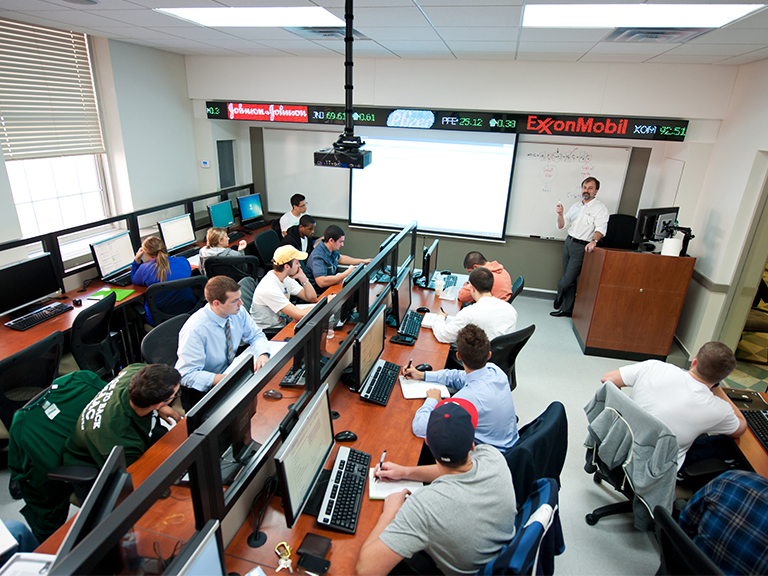 Finance student working on computer